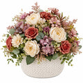 Arrangement floral artificiel multicolore avec pot bleu